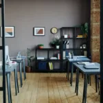 Shared office storage shelves and desk workstations in a modern space that requires organization for various team members